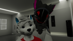 Me and my boyfriend taking a photo together, he is seen hugging me from behind.